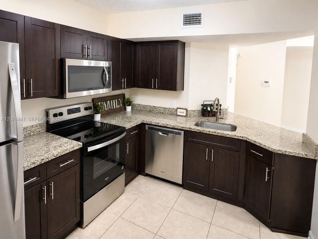 8821 Wiles Road 304, Coral Springs, FL 33067
