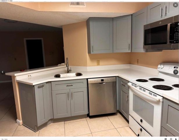 8701 Wiles Road 203, Coral Springs, FL 33067