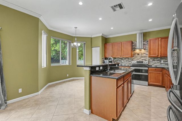 9573 Cobblestone Creek Drive, Boynton Beach, FL 33472