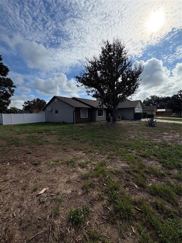 6933 REMBRANDT DRIVE, Orlando, FL 32818