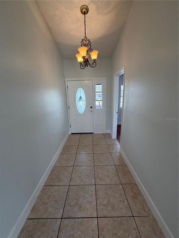 6933 REMBRANDT DRIVE, Orlando, FL 32818
