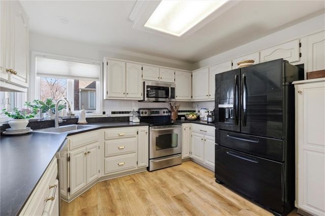 4070 SW Camelot Drive, Lee's Summit, MO 64082