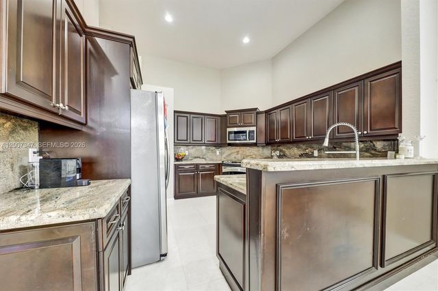 12438 NW 57th Ct, Coral Springs, FL 33076