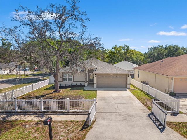 10221 N WOODMERE ROAD, Tampa, FL 33617