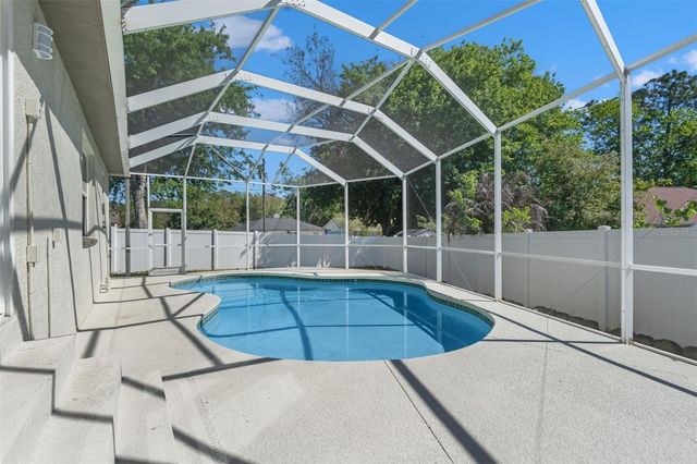 10221 N WOODMERE ROAD, Tampa, FL 33617