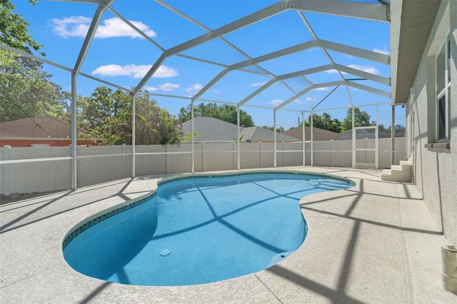 10221 N WOODMERE ROAD, Tampa, FL 33617