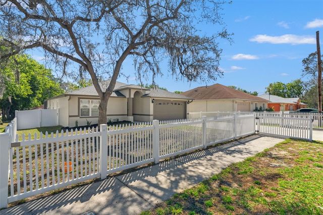 10221 N WOODMERE ROAD, Tampa, FL 33617