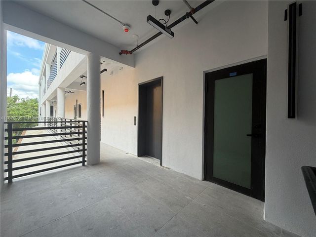 1037 NW 2nd St, Miami, FL 33128