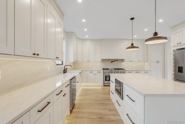 63 Harmony Drive, Massapequa Park, NY 11762