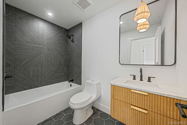 63 Harmony Drive, Massapequa Park, NY 11762