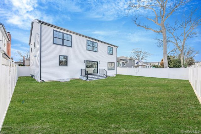 63 Harmony Drive, Massapequa Park, NY 11762