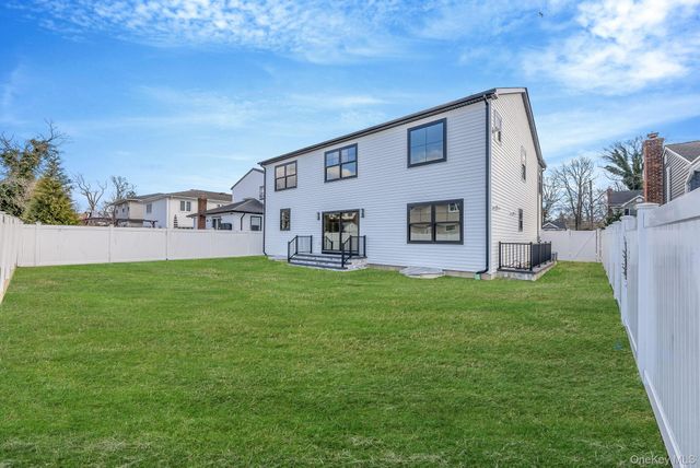 63 Harmony Drive, Massapequa Park, NY 11762