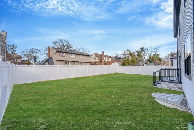 63 Harmony Drive, Massapequa Park, NY 11762