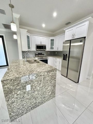 3596 64th AVE NE, Naples, FL 34120