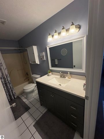 12050 Cabin Lane, Rapid City, MI 49676