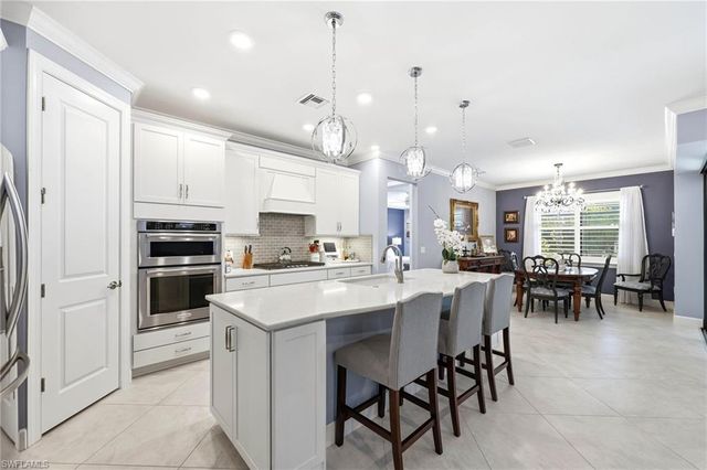 6844 Winding Cypress DR, Naples, FL 34114