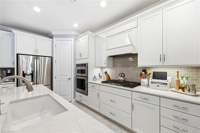 6844 Winding Cypress DR, Naples, FL 34114