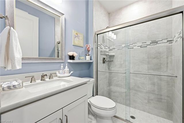 6844 Winding Cypress DR, Naples, FL 34114