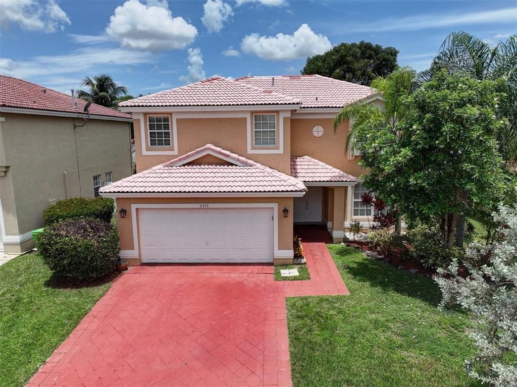 2355 NW 138th Drive, Sunrise, FL 33323