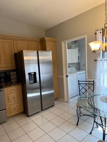 8025 Whispering Palm Drive, Boca Raton, FL 33496