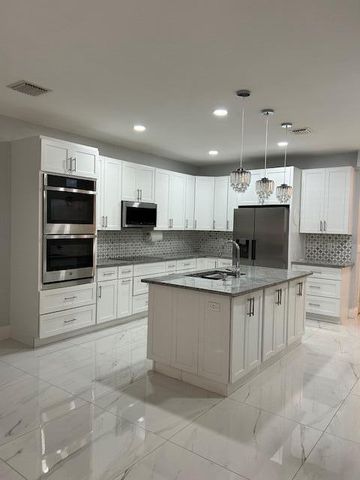 1305 Lucaya Drive, West Palm Beach, FL 33404