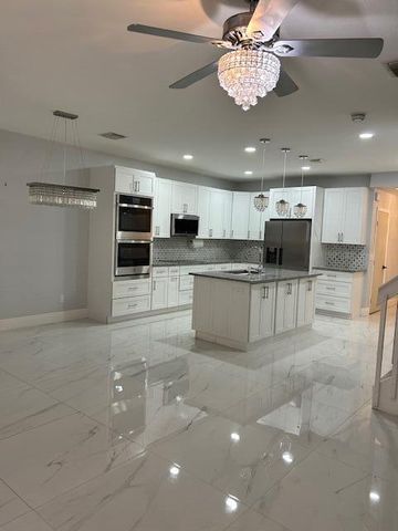 1305 Lucaya Drive, West Palm Beach, FL 33404