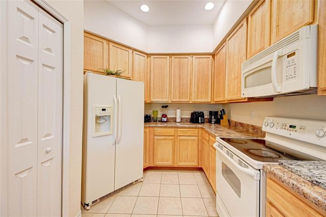 9055 TREASURE TROVE LANE 407, Kissimmee, FL 34747