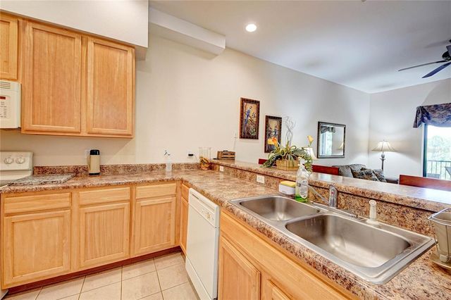 9055 TREASURE TROVE LANE 407, Kissimmee, FL 34747