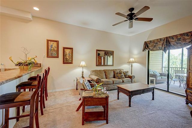 9055 TREASURE TROVE LANE 407, Kissimmee, FL 34747