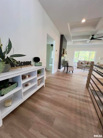 680 SWEET WOOD Lane, Blue Grass, IA 52726