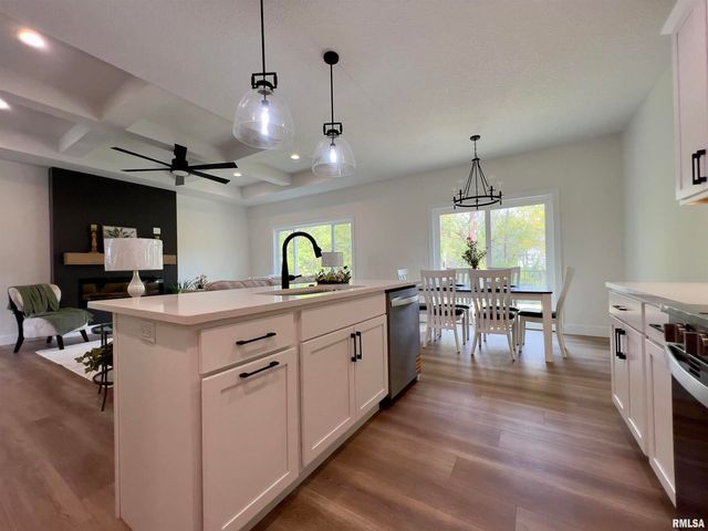 680 SWEET WOOD Lane, Blue Grass, IA 52726