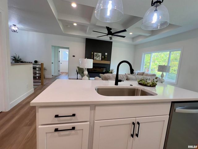 680 SWEET WOOD Lane, Blue Grass, IA 52726