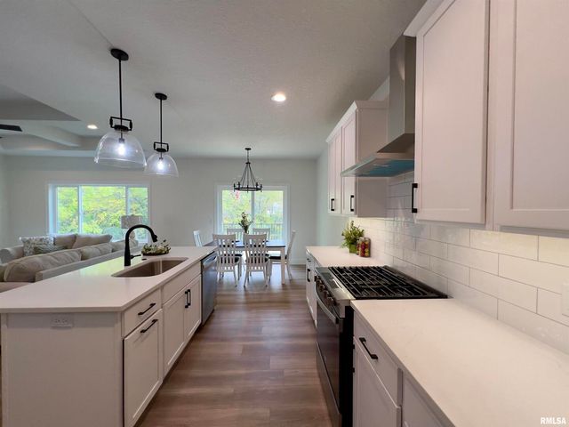 680 SWEET WOOD Lane, Blue Grass, IA 52726