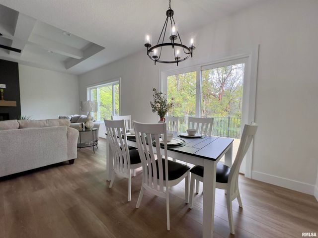 680 SWEET WOOD Lane, Blue Grass, IA 52726