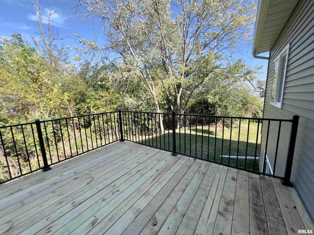 680 SWEET WOOD Lane, Blue Grass, IA 52726