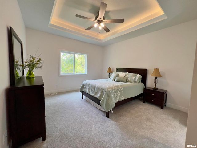 680 SWEET WOOD Lane, Blue Grass, IA 52726