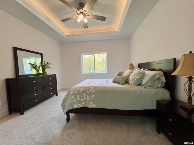 680 SWEET WOOD Lane, Blue Grass, IA 52726