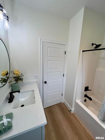 680 SWEET WOOD Lane, Blue Grass, IA 52726