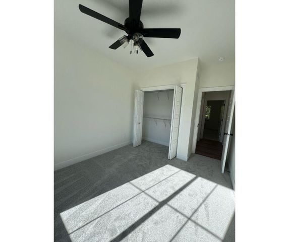 680 SWEET WOOD Lane, Blue Grass, IA 52726