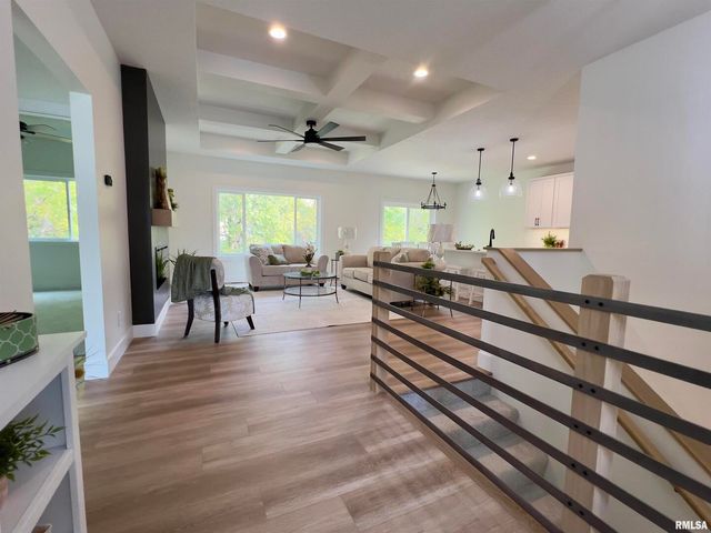 680 SWEET WOOD Lane, Blue Grass, IA 52726