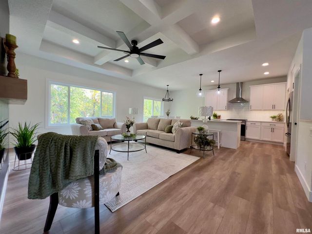 680 SWEET WOOD Lane, Blue Grass, IA 52726