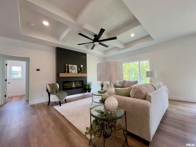 680 SWEET WOOD Lane, Blue Grass, IA 52726