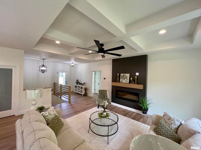 680 SWEET WOOD Lane, Blue Grass, IA 52726