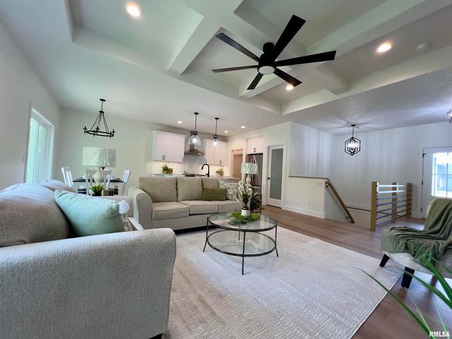 680 SWEET WOOD Lane, Blue Grass, IA 52726