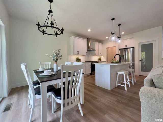 680 SWEET WOOD Lane, Blue Grass, IA 52726