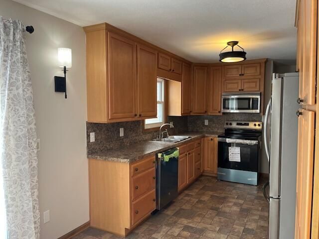 1548 Woodside Road, Roosevelt Park City, MI 49441