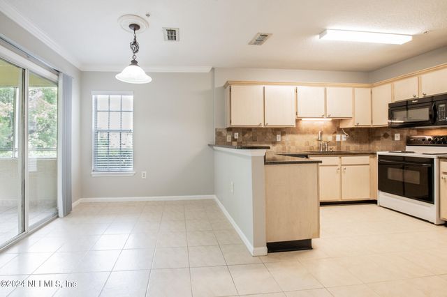 1655 THE GREENS Way 2113, Jacksonville Beach, FL 32250