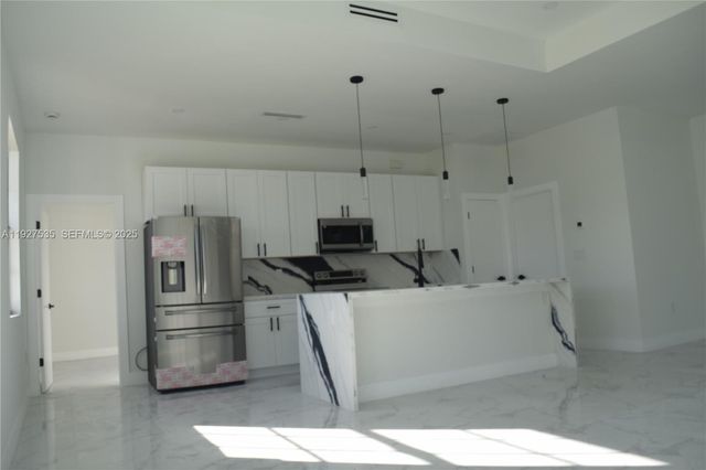 25th W 25th, Lehigh Acres, FL 33971