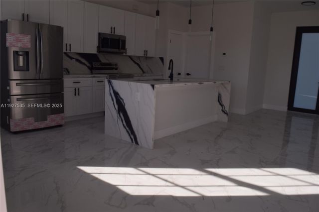 25th W 25th, Lehigh Acres, FL 33971