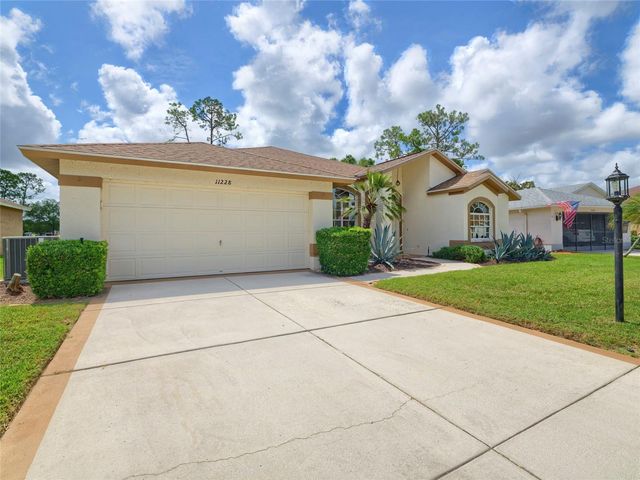 11228 WINDRUSH CIRCLE, Hudson, FL 34667